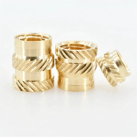 Solid Brass Knurled Insert Nuts Hot Melt Threaded Hardware For 3D Printer And Laptop Repairs M2 To M6 Sizes showing four brass inserts with knurled grip.