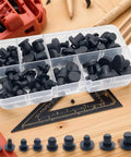 Heavy Duty Silicone Rubber Hole Plugs Set With 9 Sizes T Type Black Caps in transparent organizer box on wooden surface