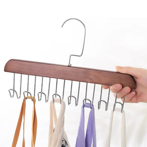Solid Wooden Closet Organizer Dual Pack Featuring Eight Smooth Stainless Steel Hooks holding scarves in a hand.