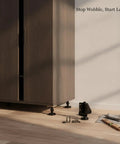 Adjustable Cabinet Feet For Uneven Floors Heavy Duty Cold Rolled Steel Wardrobe Supports with tools next to a cabinet on floor