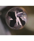 Close-up of carbide ball end mill bits with four flutes and TISIN coating, one quarter inch shank, for hard metals.