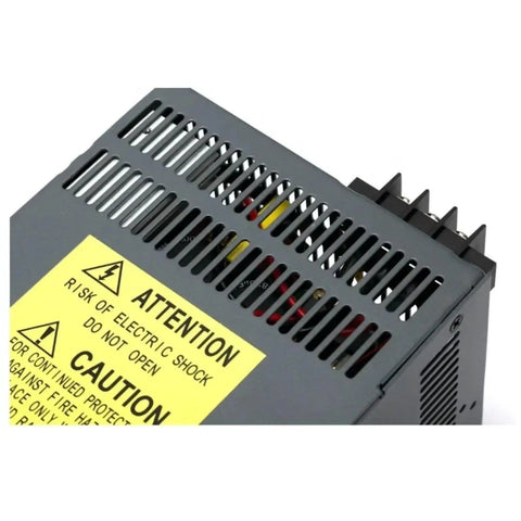 Knockout Industrial Switching Power Supply converts AC 220 volts into relentless DC 24 volts, front view with warning labels.