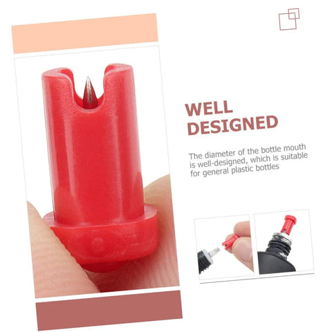 Close-up of red plastic eyelash glue nozzle pin designed to fit standard cosmetic bottles, part of 100 Pack Precision Eyelash Glue Bottle Nozzle Pins Anti Clog Plastic Tips.