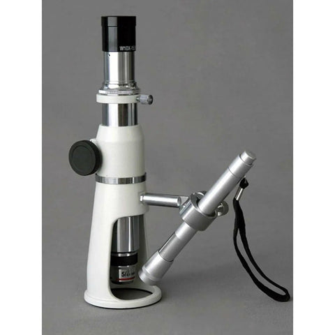 Handheld Measuring Microscope With 20x 50x 100x Magnification, 100 Unit Range, 0.01 Reticle, Achromatic Lenses, 17mm Field Of View, 30mm Working Distance, Ideal For Field Work, Lab, And Quality Control Inspections., handheld measuring microscope with silver body and black eyepiece, side view