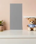 Rock Solid Premium Peel And Stick Xpe Foam Wall Pads on nursery wall with teddy bear and succulent plant.