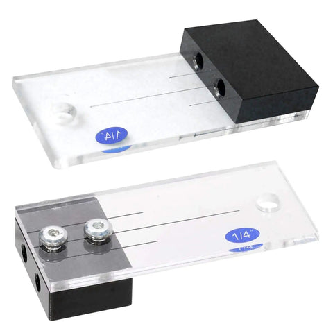 Rock Solid One Quarter Inch Dowel Drilling Jig Kit With Hardened Steel Bore Guides And Clear Acrylic Base, showing durable guides and alignment markings.