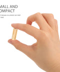 Hand holding copper alloy standoff from Copper Alloy Standoffs And M3 Screw Kit With Nuts In Compact Storage Box For DIY Electronics.