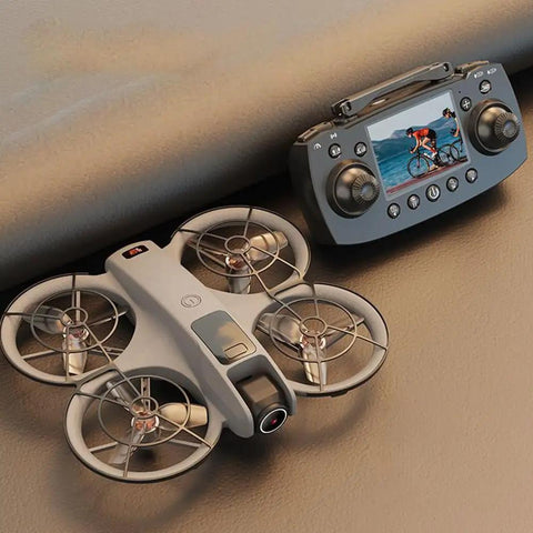 Mini Drone For Kids Super Easy To Fly With 3D Flips And 360 Degree Rotation next to remote control with display screen