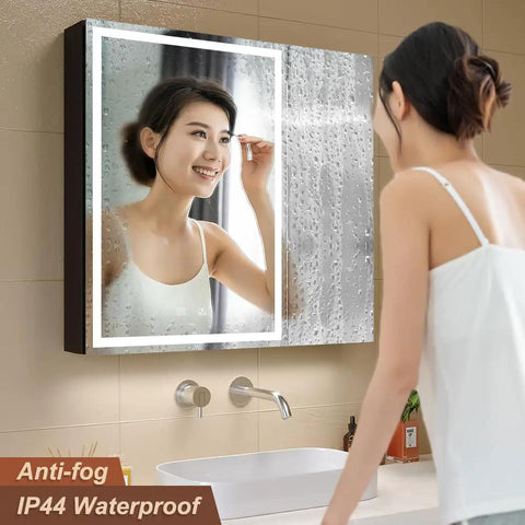 Woman using LED Lighted Bathroom Medicine Cabinet With Backlit Panel, USB Sockets, Anti Fog, Dimmable 3 Color Light Makeup Mirror.