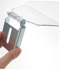 One Pair Bench Dust Guard Plates With Transparent Eye Shield Kit held in hand showing metal plate and clear shield for grinders