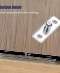 Close-up of metal floor guide from Mini Cabinet Bypass Double Sliding Barn Door Hardware Track Kit, prevents door wobbling.
