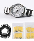 Pro Grade Rubber Watch Gasket Set For 16mm To 34mm Cases, 10 Sizes With 0.5mm And 0.6mm Thickness next to a chronograph watch