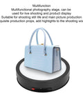 Super Smooth 360 Degree Rotating Display Stand Electric Turntable With Adjustable Speed And Remote Control, Plus Colorful Led Lights For Pro Photos And Videos That Look Totally Fire On Your Socials showcasing a blue handbag.