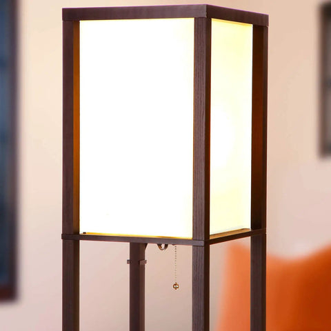 Top view of Dope Shelf Floor Lamp With USB Ports And Wireless Charging Pad And Outlets, Havana Brown with lit lampshade.