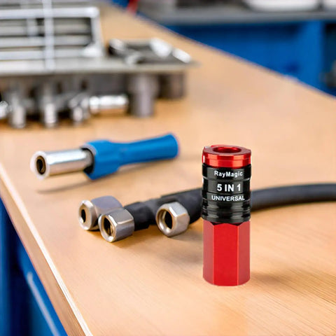 Heavy Duty 5 In 1 Universal Quick Industrial Air Coupler With Dead Simple Setup And Knockout Durability For 1/4 Inch Female Npt Air Compressor Fittings Quick Connect Accessory In Bold Red on workbench with tools.