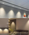 Ceiling view with Three Inch Gimbal LED Recessed Light With Dimmable Canless Design EZ Install 8W highlighting walls.