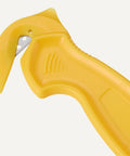 Close-up of Straight Up Film Safety Cutter With Recessed Stainless Steel Blade And Built In Tape Splitter For Snappy Box Cutting.