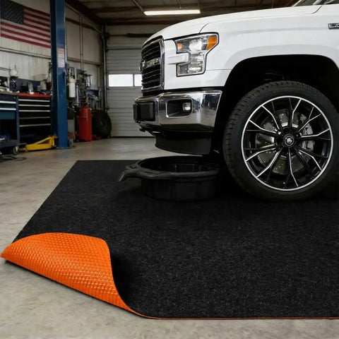 Oil Spill Mat For Garage Floor 64x32 Inches Under Car Absorbent And Waterproof Shop Grade Floor Protector in use under truck