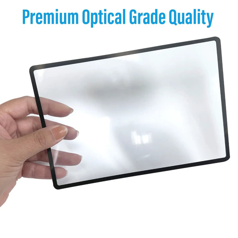 Hand holding 2 Pack Large Full Page Magnifying Sheet With 3X Magnification And 3 Fresnel Lens Bookmark Magnifiers, close-up view