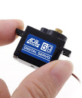 Person holding a small black digital servo marked with '5g', suitable for RC cars and planes, highlighting compact size and lightweight design.
