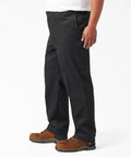 Heavy Duty Mens Straight Leg Work Pants Crafted From Tough Poly Cotton Blend Features Wrinkle Resistant Black Uniform Trousers Built Different For The Daily Grind And Size 29W By 30L shown in side view.