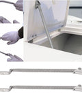 Bad Boy 2 Pack Hatch Support Springs 304 Stainless Steel 8 1/4 Inch Heavy Duty Lid Struts with gloves handling the struts.
