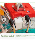 Close-up of fertilizer outlet on Walk-Behind Seed Spreader For Lawn And Farm No-Fuss Manual Push Roller Seeder With Dual 5-Hole Sowing.