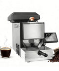No Sweat Smart Coffee Bean Roaster With 200 Gram Capacity And Clean Digital Interface For Quick Auto Roasting Of Quality Beans And Toasted Nuts Straight On Your Counter With Reliable Smoke Guard Keeping Indoor Spaces Fresh next to a cup of coffee.
