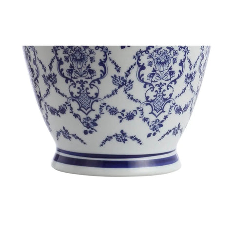 Detail of Chinoiserie Blue And White Ceramic Table Lamp With Urn Silhouette pattern.