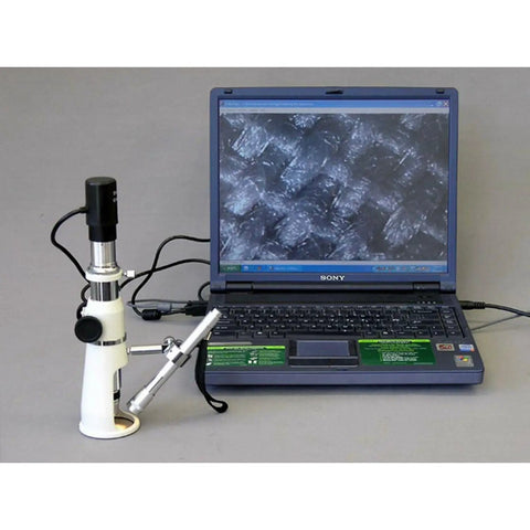 Handheld Measuring Microscope With 20x 50x 100x Magnification, 100 Unit Range, 0.01 Reticle, Achromatic Lenses, 17mm Field Of View, 30mm Working Distance, Ideal For Field Work, Lab, And Quality Control Inspections, beside laptop display