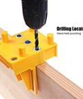 Precision Woodworking Dowel Jig Kit With Rugged Metal Bushings And A Straight Shooter Handle for DIY joinery in use on wood.