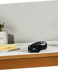 Built Tough Heavy Duty Sliding Door Wheels Featuring Whisper Quiet Rollers For Barn Door Hardware on a desk with a plant.