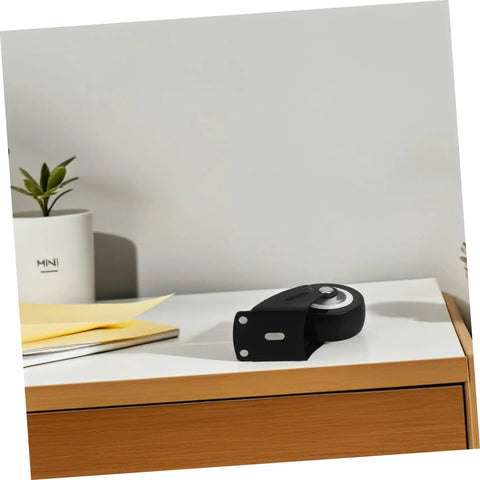 Built Tough Heavy Duty Sliding Door Wheels Featuring Whisper Quiet Rollers For Barn Door Hardware on a desk with a plant.
