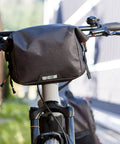 Alpha Handlebar Bag 6 Liter for City Commutes and Bike Tours, Weatherproof Messenger With Roll Top And Tech Pocket, Recycled Materials, Black