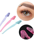 Women Foldable Eyebrow Razor For Safe Precise Hair Removal Effortless Brow Shaping With Sturdy Stainless Blades Portable Travel Ready grooming tools in pink, blue, and purple colors.