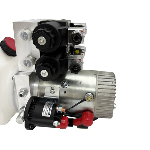 Close-up of 2200W Hydraulic Power Unit with 24V DC motor and pump, showcasing valves and electrical components.