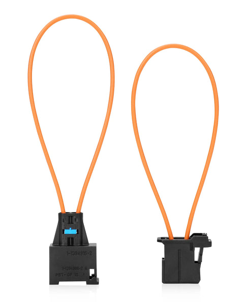 Front view of two orange fiber-optic loop bypass adapters with black male and female connectors