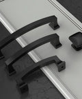 Matte Black 3 Inch Cabinet Pulls 10 Pack With 76mm Hole Centers Kitchen Cabinet Hardware Handles for Cabinets Cupboards and Drawers Easy Install Modern Flat Drawer Pulls displayed on a surface with a knob