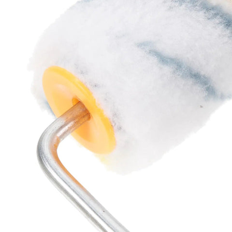 Close-up of a roller head from the Ready To Roll Mini Paint Roller Brush Kit With Quick Swap Covers For Doors Baseboards And Window Trim Professional Wall Painting Tool That Makes Painting A Breeze.