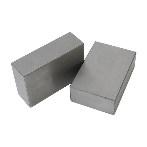 Two 1x2x3 hardened steel machinist milling blocks, angled view, no holes, matched pair
