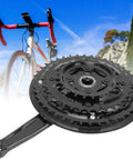 Beefy High Carbon Steel Mountain Bike Crankset 24-34-42T With Chain Guard, shown against a scenic trail background