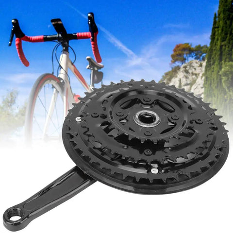Beefy High Carbon Steel Mountain Bike Crankset 24-34-42T With Chain Guard, shown against a scenic trail background