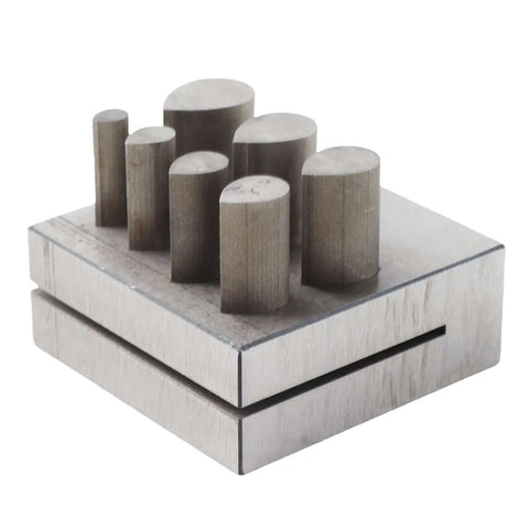 Punch Die Disc Cutter Set For DIY Jewelry Making, showing drop shaped dies in seven sizes on a 45 steel base.