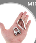 Hand holding 8 Piece 3/8 Inch Wire Rope Clamps And 4 Pcs M10 Stainless Steel Thimbles For Cable Rigging