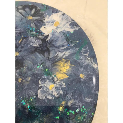 Close-up of blue, gold, and white floral resin design on 16-inch Lazy Susan, wood base, art organizer for kitchen, dining table.