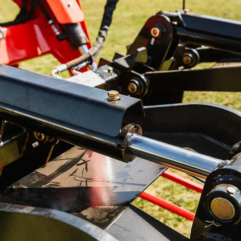 Close-up of 72 Inch Manure Tine Grapple Bucket Attachment with SSQA Hay Spear Frame, showing twin 3000 PSI cylinders