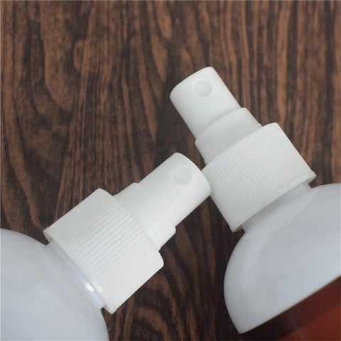 Close-up of spray nozzles on Wooden Repair Spray Quick Fix Scratch Remover For Tables Beds Floors 120Ml Instant Repair Paint.