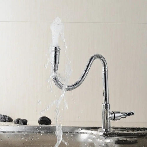 Single Lever Flexible Pull Out Kitchen Water Tap With Deck Mount Cold Water Basin Faucet spraying water in chrome finish