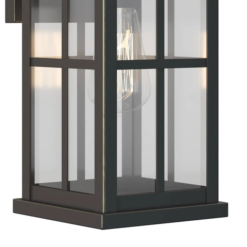Close-up of Williamston Collection 1 Light Clear Glass Antique Bronze Farmhouse Outdoor Large Wall Lantern Light showing windowpane design.