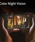 Hands holding phone showing video from Cam 2 Indoor Outdoor WiFi Security Camera With Full Color Low Light Video, Motion Detection